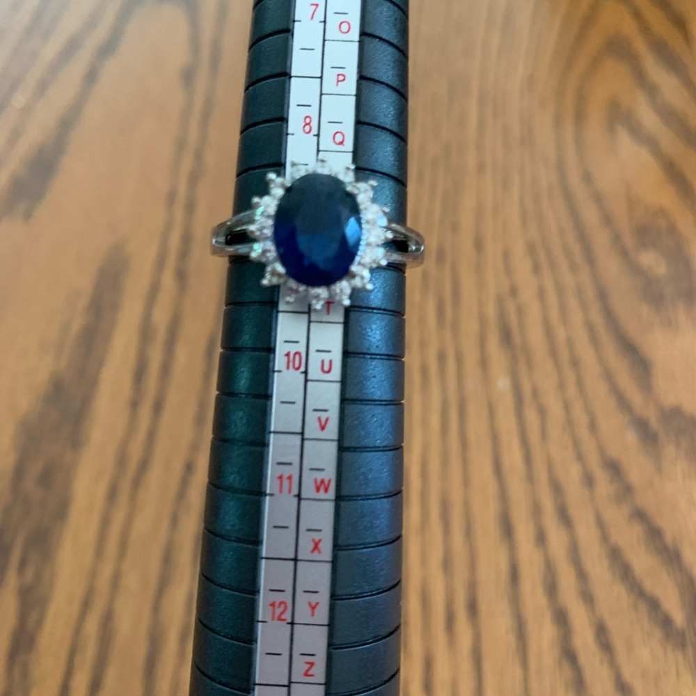 Costume ring, silver with blue sapphire